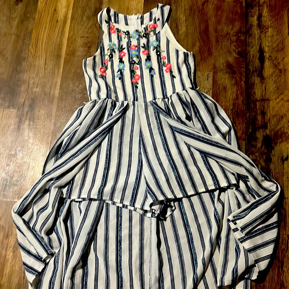 This dress has been worn a couples times. I also won a pageant with the dress.